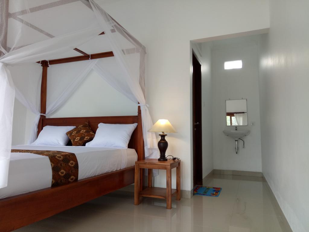 Minory Guesthouse Amed  Bagian luar foto